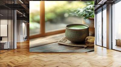 Serene Moment with Matcha Tea - Traditional Japanese Green Tea Preparation on Wooden Table Wall mural