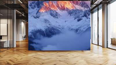 Serene Sunrise in Snowy Mountain Range | Idyllic Morning Light on Alpine Peaks and Valleys Wall mural