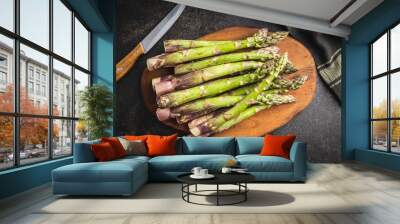 Fresh raw uncooked green asparagus. Wall mural