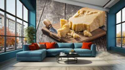 Pieces of italian parmesan cheese. Block of parmesan Wall mural