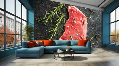 Raw veal schnitzel. Raw meat and rosemary Wall mural