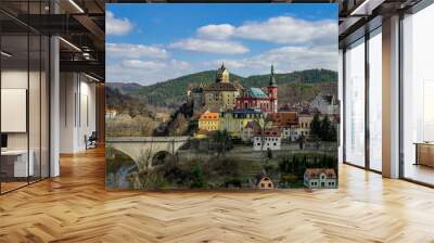 Loket is a historic town on the eastern edge of the Sokolov district. Loket is situated at the foot of the Slavkov Forest on the meander of the Ohře River and used to be an important royal town. Wall mural