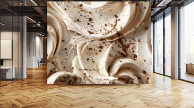 A closeup of the texture and swirls in Vanilla ice cream with Chocolate chip topping  Wall mural