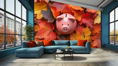 a piggy bank surrounded by colorful autumn foliage.  Wall mural