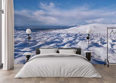 snow covered mountains on a bright day in Scotland Wall mural