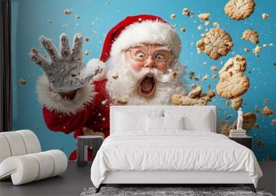 A joyful Santa Claus unexpectedly reacts as cookies fly in the air, spreading holiday cheer and surprise. Wall mural