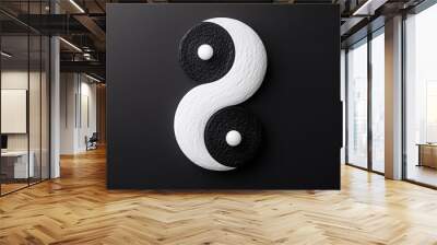 Elegant yin yang symbol in black and white on a dark background, representing harmony and balance in design and life. Wall mural