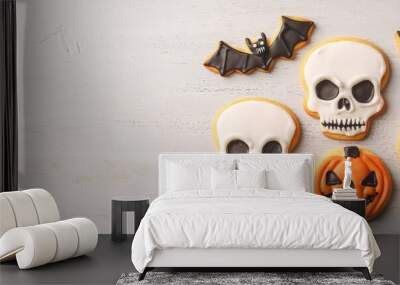 Festive Halloween cookies featuring skull and pumpkin designs, perfect for spooky celebrations and themed parties. Wall mural