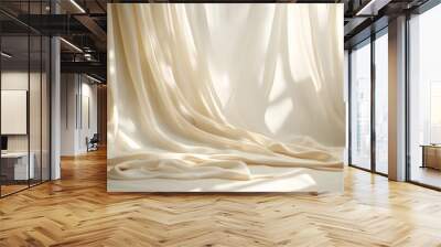 Elegant fabric drape with soft flowing folds in neutral tones creating a calm and serene studio background perfect for product shots fashion photography or minimalist design Wall mural