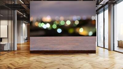 View from wooden plank above cityscape bokeh Wall mural