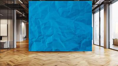 Wrinkled blue paper fragment as a background texture Wall mural