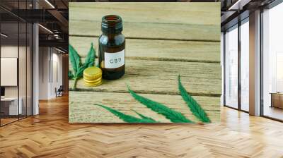 Cannabis with extract oil in a bottle Wall mural