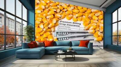 Crop insurance, premium bill, corn kernels and 100 dollar bills. Concept of yield loss, hail and wind field damage and farm income protection. Wall mural