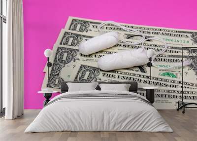 Tampons and cash money. Tampon shortage, tax, pink tax and feminine hygiene products price increase concept Wall mural