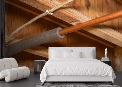 Water pipe with insulation in house crawlspace. Plumbing freezing protection, energy savings and home repair Wall mural