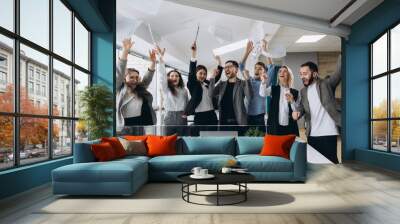 Success and winning concept - happy business team celebrating victory in office Wall mural