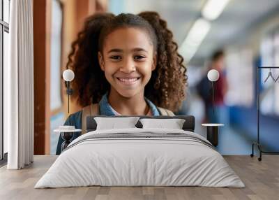 Portrait of young black girl student smiling happily in school Wall mural