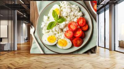 Delicious Plate of Cottage Cheese with Tomatoes and Hard Boiled Egg on a Wooden Table Shot from Above. Diet Healthy Food Wall mural