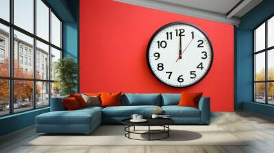 Wall Clock on a Red Background Wall mural