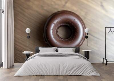 Chocolate Doughnut Sprinkled with Chocolate Chips on a Wooden Table Wall mural