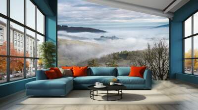 French countryside in the morning mist, winter on the valley seen from Col de la Luère, Rhône - France Wall mural