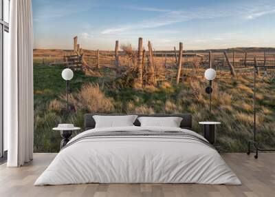 Evening view of an old fence in Grasslands National Park, Saskatchewan, Canada Wall mural