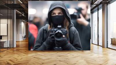 press and media photographer on duty in public news coverage event for reporter. Wall mural