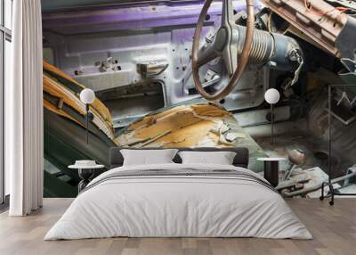 Old damaged interior of a classic car Wall mural