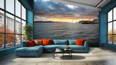 View of the Tagus River in Lisbon, Portugal with the 25 de Abril Bridge in the background Wall mural