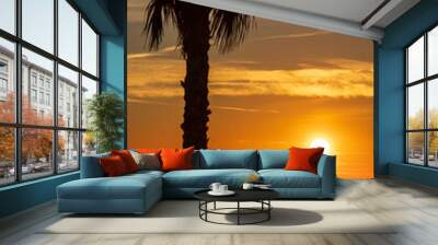 Sunrise on the beach. Wall mural