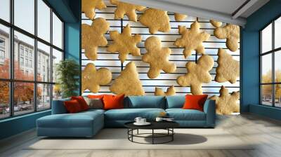 Gingerbread cookie cutouts on a wire cooling rack Wall mural