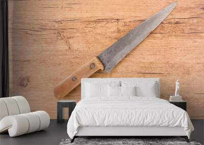 old knife on wood background Wall mural