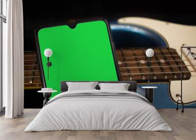 Electric guitar. Chroma green mobile phone Wall mural