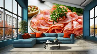 Ham slices and herbs on plate. Wall mural