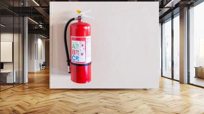 Fire extinguisher system on the wall background, powerful emergency equipment for industrial Wall mural