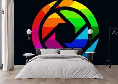 A rainbow stylized camera icon composed of geometric shapes Wall mural