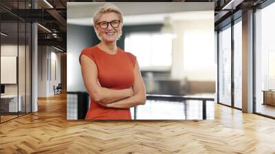 Portrait, arms crossed and smile of business woman in office with pride for career and job. Ceo glasses, boss face and happy, confident and proud elderly female entrepreneur from Canada in company. Wall mural