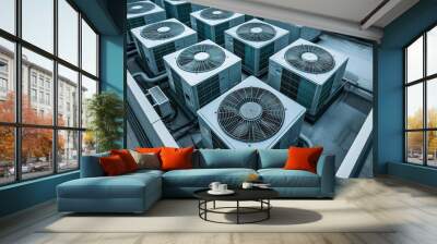 A group of commercial air conditioners sitting on top of a roof in a typical urban environment. Wall mural