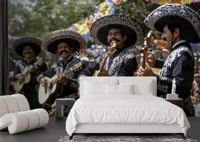 A vibrant group of five mariachi musicians captivates an audience with traditional music at a festive outdoor celebration Wall mural