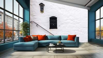 Rock wall painted in white with railing and two letter boxes for mediterranean style. Wall mural