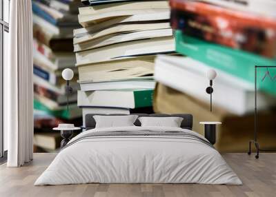 Stack of study books, concept of intellectuals. Wall mural