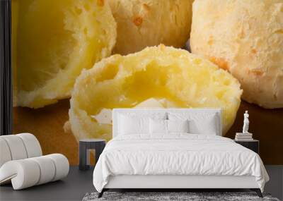 Cut traditional Brazilian snack cheese bread with melted butter Wall mural