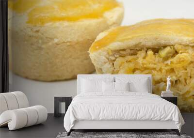 Two traditional Brazilian mini chicken pie called empada with one cut close Wall mural