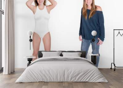 Two full length portraits of an attractive young woman wearing casual clothes and a white swimsuit, isolated on white studio background Wall mural