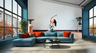 young asian beauty woman doing yoga at home Wall mural