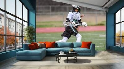 Young athletes making amazing plays while playing Lacrosse Wall mural