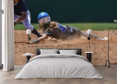 Young girls playing the sport of fastpitch softball Wall mural