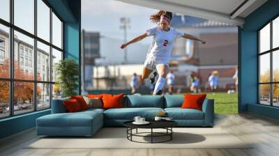 Young soccer player in action Wall mural