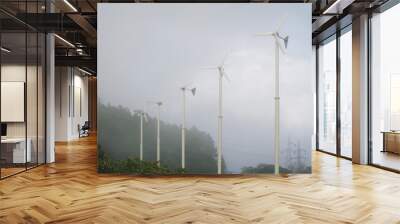 Landscape Photography of Wind Turbines or Wind Generators in The Mist for This is The Renewable,  Green or Clean Energy . Wall mural