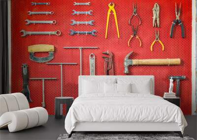 Show hardware set on the wall,firstaid equipment ready to fix in home with red board background Wall mural